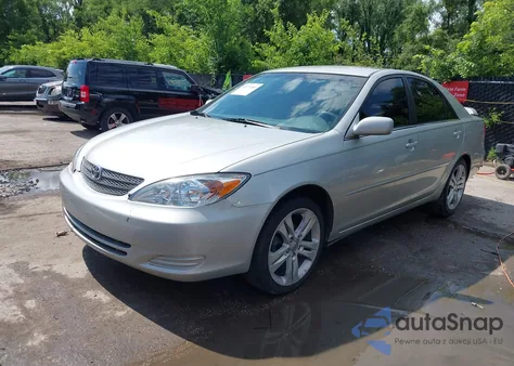 2002 Toyota Camry Le z USA, uszkodzony, nr VIN 4T1BE32K22U007923